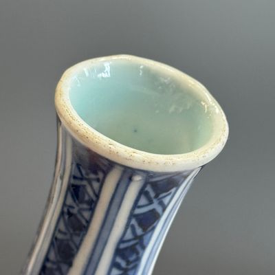 A Chinese blue and white double-gourd vase with floral design — photo 11