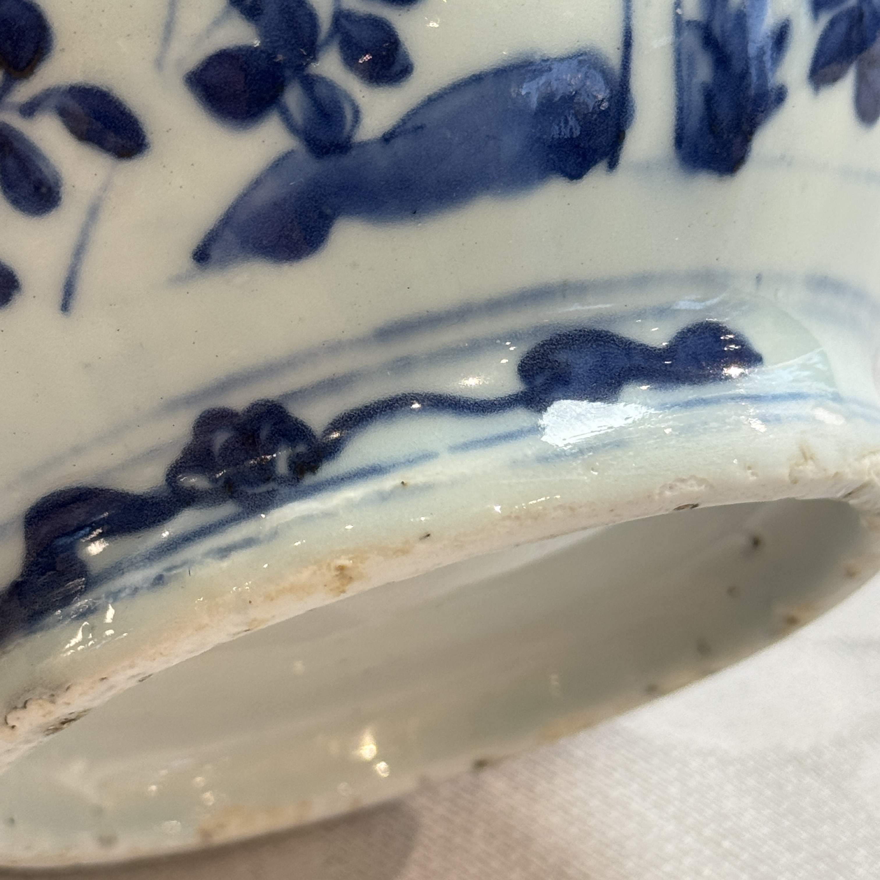 A Chinese blue and white double-gourd vase with floral design — photo 19