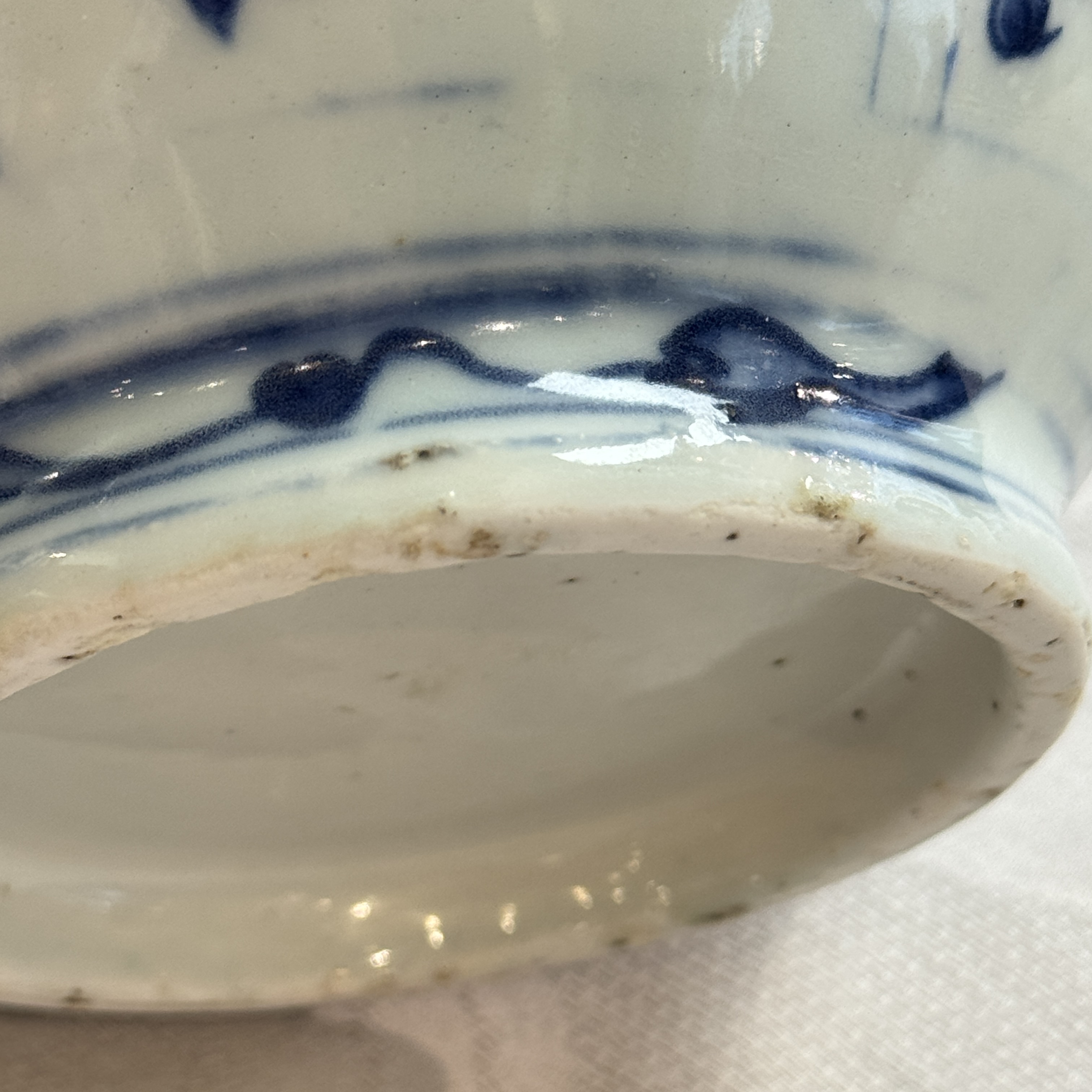 A Chinese blue and white double-gourd vase with floral design — photo 21