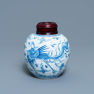 A Chinese blue and white 'dragon and phoenix' jar with wooden lid, Chenghua mark, Kangxi — photo 1