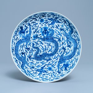 A Chinese blue and white 'dragon' dish, Kangxi mark and of the period — photo 1