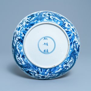 A Chinese blue and white 'dragon' dish, Kangxi mark and of the period — photo 2