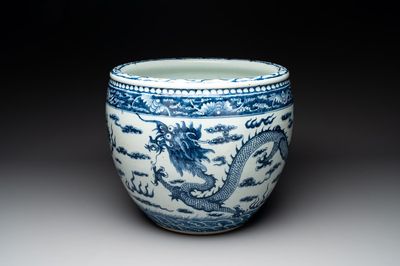 A Chinese blue and white 'dragon' fish bowl, 19th C.