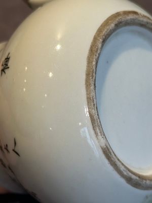 A Chinese blue and white 'dragon' vase, a famille rose 'millefleurs' vase and a teapot, Qianlong mark, 19/20th C. — photo 46