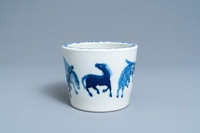 A Chinese blue and white 'Eight horses of Mu Wang' jardinière, Qianlong mark, 19th C.