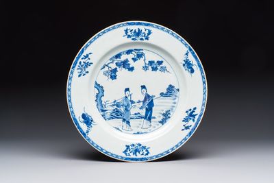 A Chinese blue and white 'Elegant Ladies in a Garden' dish, Qianlong