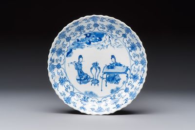A Chinese blue and white 'Elegant Ladies Making Music' plate, Chenghua mark, Kangxi