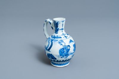 A Chinese blue and white ewer with figures in a landscape, Transitional period