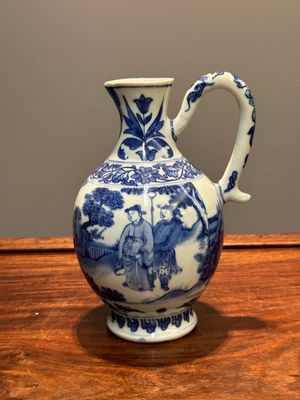 A Chinese blue and white ewer with figures in a landscape, Transitional period — photo 1