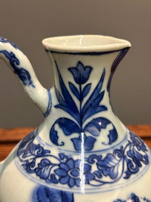 A Chinese blue and white ewer with figures in a landscape, Transitional period — photo 18