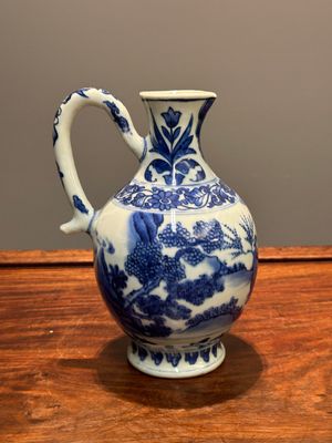 A Chinese blue and white ewer with figures in a landscape, Transitional period — photo 3
