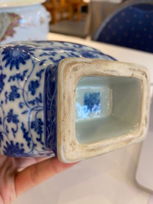 A Chinese blue and white 'fanghu' vase with lotus scrolls, Qianlong mark, 19/20th C. — photo 15