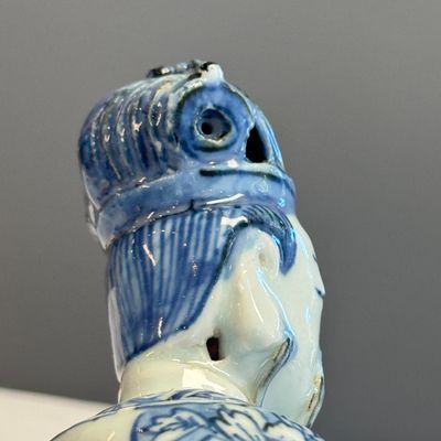 A Chinese blue and white figure of a Daoist deity — photo 13