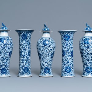 A Chinese blue and white five-piece garniture with floral design, 19th C. — photo 2
