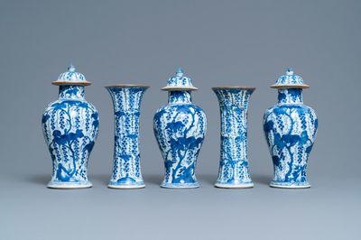 A Chinese blue and white five-piece garniture with grapevines, Kangxi