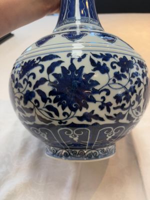 A Chinese blue and white 'flower scroll' bottle vase, Xuantong mark, 20th C. — photo 9