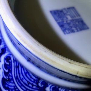 A Chinese blue and white 'flower scroll' vase, Qianlong mark, 19/20th C. — photo 24
