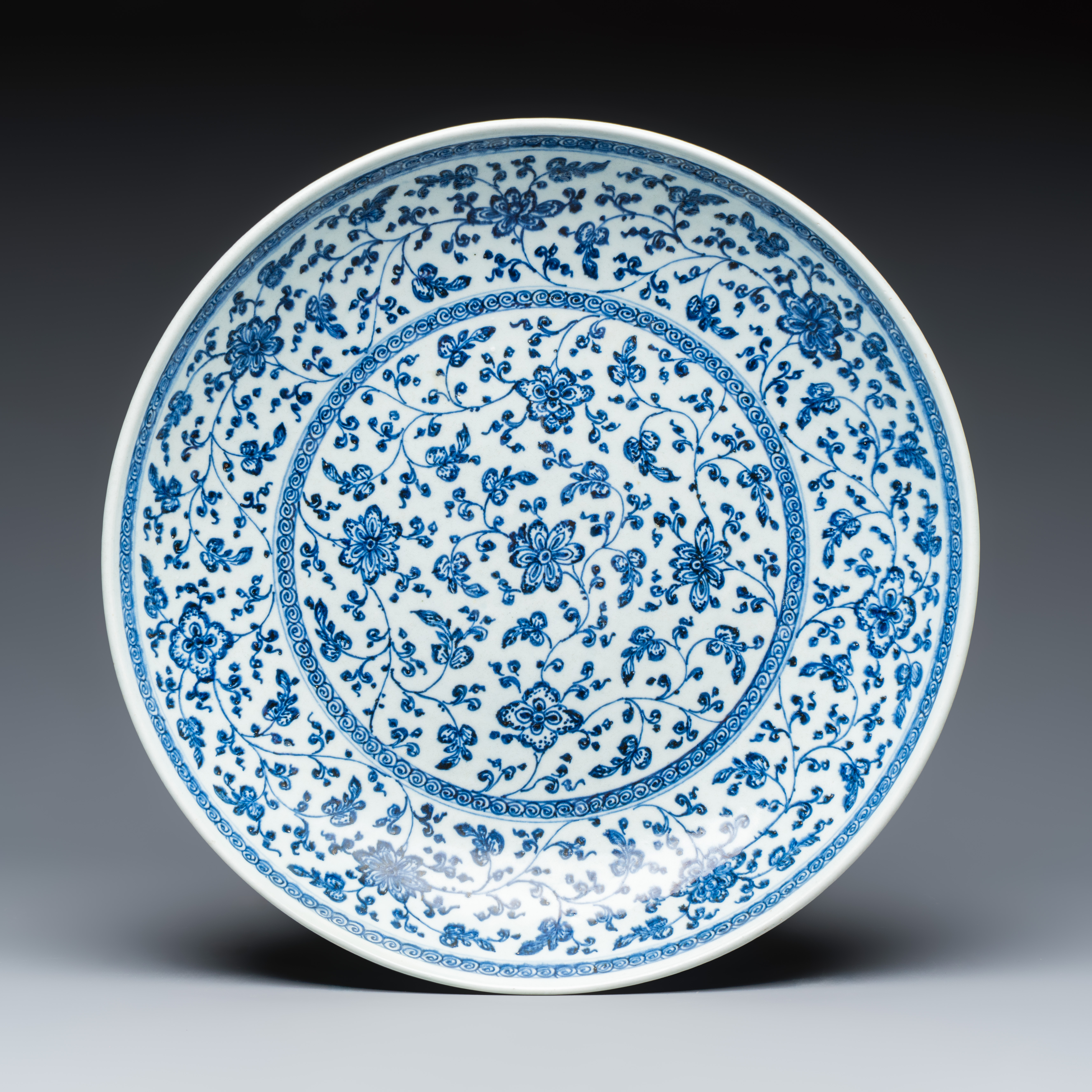 A Chinese blue and white 'Flower Scrolls' dish, Qianlong