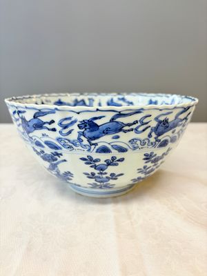 A Chinese blue and white 'Flying Horses and Landscapes' bowl — photo 1