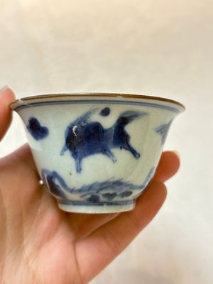 A Chinese blue and white 'flying horses' cup, Da Qing Bing Wu Nian Zhi 大清丙午年製 mark, dated 1666 — photo 1
