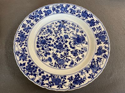 A Chinese blue and white 'four seasons' dish, Kangxi mark and of the period — photo 1