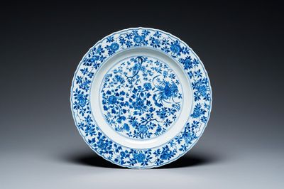 A Chinese blue and white 'four seasons' dish, Kangxi mark and of the period