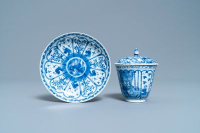 A Chinese blue and white French market covered cup and saucer, Kangxi