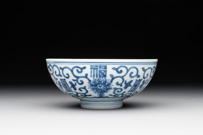 A Chinese blue and white 'fu and shou' bowl with flower scrolls, Yongzheng mark and of the period