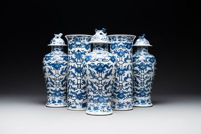 A Chinese blue and white garniture of five vases with lotus scrolls, 19th C.