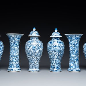A Chinese blue and white garniture of six vases with floral design, Kangxi — photo 2