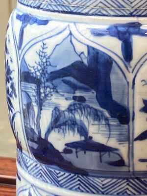 A Chinese blue and white garniture of three vases with floral and landscape design, Kangxi — photo 21