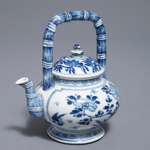 A Chinese blue and white gate-handled teapot and cover, Kangxi — photo 1