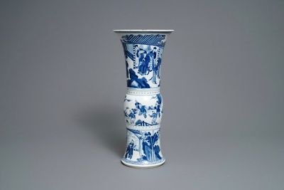 A Chinese blue and white gu vase with figurative design, Kangxi