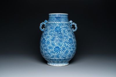 A Chinese blue and white 'hu' vase with lotus scrolls, Qianlong mark, 19th C.