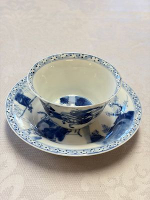 A Chinese blue and white 'Hunting Scene' tea bowl and saucer — photo 1