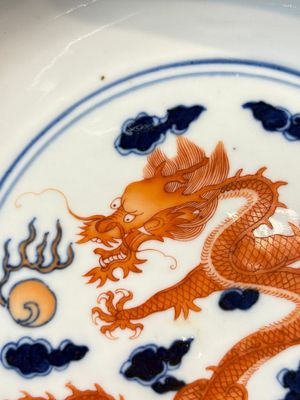 A Chinese blue and white iron-red-decorated 'Dragon' plate, Jing Jin Tang 精進堂 mark, 19th C. — photo 3
