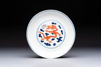 A Chinese blue and white iron-red-decorated 'Dragon' plate, Jing Jin Tang 精進堂 mark, 19th C.