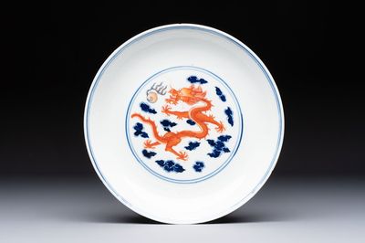 A Chinese blue and white iron-red-decorated 'Dragon' plate, Jing Jin Tang 精進堂 mark, 19th C.