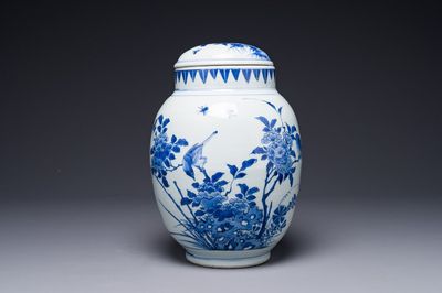 A Chinese blue and white jar and cover with birds and flowers, Transitional period