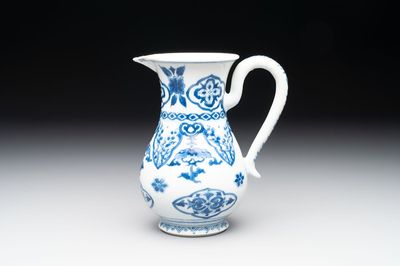 A Chinese blue and white jug with floral design, Kangxi