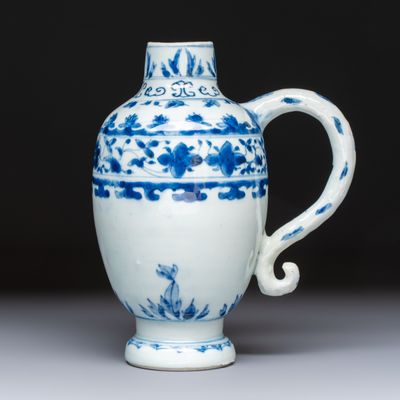 A Chinese blue and white 'Floral' jug, Transitional period, Transitional period