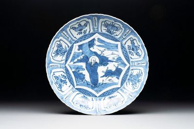 A Chinese blue and white 'kraak' dish with Damo in a landscape, Wanli