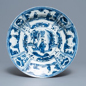 A Chinese blue and white kraak porcelain dish with figures in a landscape, Transitional period — photo 1