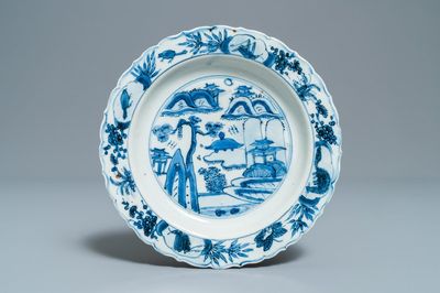 A Chinese blue and white kraak porcelain plate with a landscape, Wanli