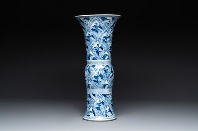 A Chinese blue and white 'landscape' 'gu' vase, Kangxi