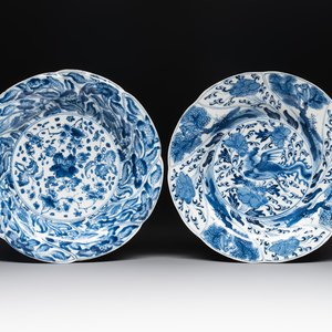 A Chinese blue and white lobed 'flower' plate and a 'phoenix and monkeys' plate, Kangxi — photo 1