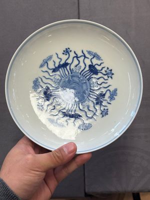 A Chinese blue and white 'lotus pond' plate, Qianlong mark, 19/20th C. — 照片 1