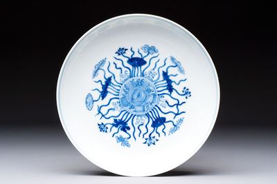 A Chinese blue and white 'lotus pond' plate, Qianlong mark, 19/20th C.