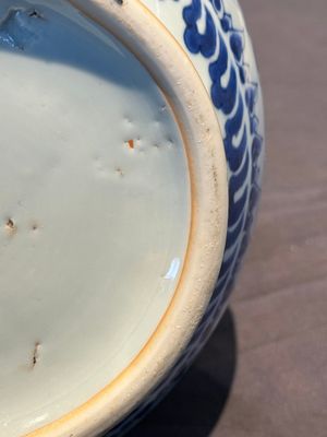 A Chinese blue and white 'lotus scroll' bottle vase, Transitional period — photo 14
