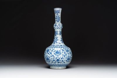 A Chinese blue and white 'lotus scroll' bottle vase, Transitional period